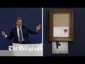 Banksy's part-shredded artwork sells for £18.6m in record for artist