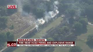 Firefighters work to put out brush fire near Hillsborough County Sheriff's Office training facility