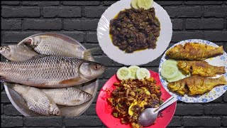 Today's lunch was with Rohu fish head fry, puthi mass fry and fish intestine with Assamese khar.