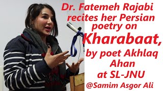 Dr. Fatemeh Rajabi dedicates her Parsian poem to Poet Akhlaq Ahan at the symposium on \