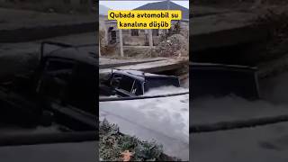 Qubada avtomobil su kanalına düşüb