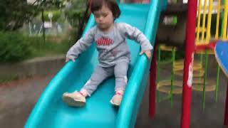 Toddler Climbing on the jungle gym