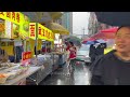 漢口，雨中漫步。hankou walking in the rain. streets of wuhan china saturday may 4 2024. 武漢 wuhan