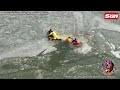 dramatic rescue of lucky teens from icy water by nearby firefighters performing ice rescue drill