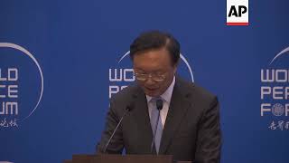 Top Chinese official reiterates Beijing's opposition to trade war