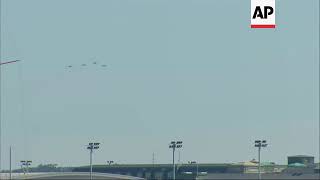 Fighter jets fly over McCain burial
