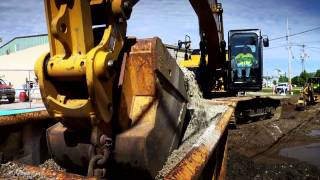 Cat® 320E L RR Excavator Solves Tight-Space Dilemma