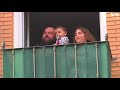 spanish volunteers try to cheer up residents in town outside madrid