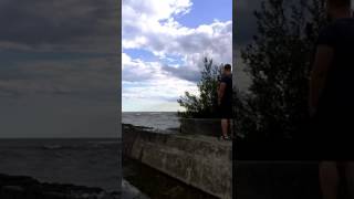 Big waves splash us on pier port maitland