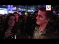 Revellers gather on the Champs Elysee to celebrate New Year's Eve