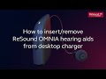 How to insert/remove ReSound OMNIA from desktop charger