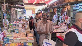 Explore the oldest book market in Egypt -- Azbakya's Wall