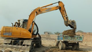 Mighty Soil Loading Show: Powerful Samsung MX132W Excavator at Work