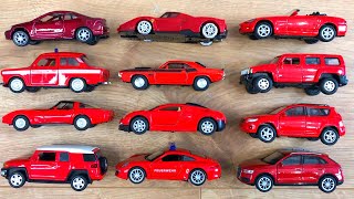 Various Red Diecast Model Cars From The Floor - Red Cars