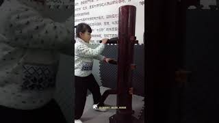 Unleashing the Power of Wing Chun: A Young Girl's Wooden Dummy Training Session