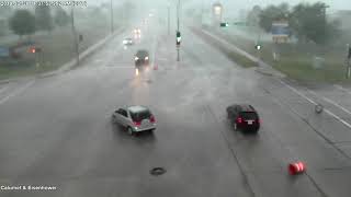 Construction barrels blown around by strong storm