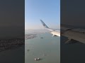 landing in xmn. xiamen gaoqi international airport fujian china 楼宇间的降落 厦门高崎机场（xmn）05跑道降落 左侧舷窗视角