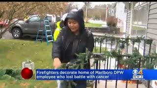 Firefighters bring gift of joy and light to Hudson woman