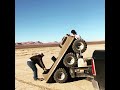 unloading a 6 wheeler off a trailer