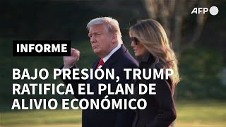 Bajo presión, Trump ratifica el plan de alivio económico | AFP