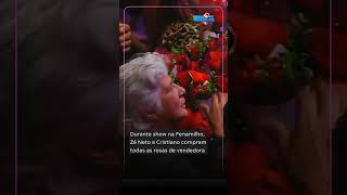 Zé Neto e Cristiano compram rosas de vendedora e a levam ao palco para distribuir na Fenamilho 2024