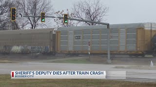 Bossier Parish deputy struck by train dies