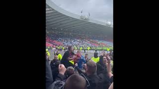 James Tavernier singing with the Rangers fans