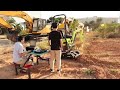 wallemac electric mini excavator digging