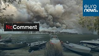 Raging wildfires and huge plumes of smoke in Lake Conjola, Australia