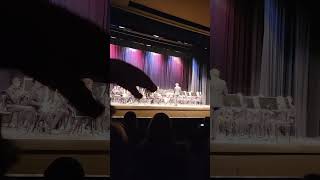 Autism# Trying to film my son In his school band with oscar and his dancing fingers.