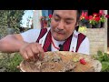 happy ngada festival of rengma nagas eating perilla seeds with chicken naga rengma dish.