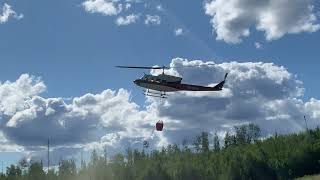 Helicopter with a short bucket on the Munson Creek Fire, July 10, 2021.