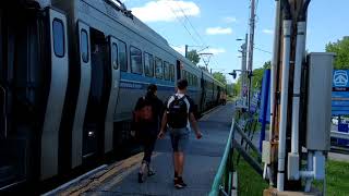 TRAINS Ille Bigras Station Stop of MR90 Electric Train in Montreal Suburbs