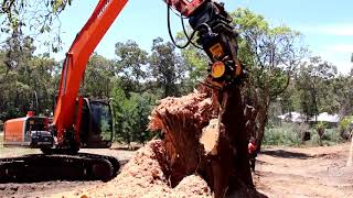 MB-R800 mounted on a Hitachi exacvator, grinding down tree stump.