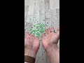 throwing green beads reverse video shorts