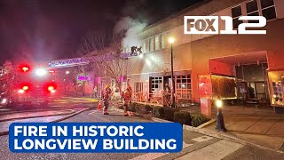 Crews prevent fire in historic Longview building from spreading to apartments