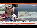 turistas no se rinden llegan a playas pese a aviso de marejadas