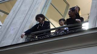 MODELS FOR YOHJI YAMAMOTO STANDING ON A BALCONY @ YOHJI YAMAMOTO FASHION SHOW IN PARIS 2020.01.16