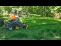 Hustler Raptor Cutting Overgrown Yard in 100 Degree Heat