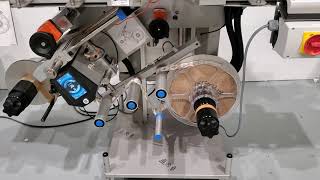 Clamshell closing & labeling system