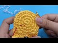 Thanh Mai guides knitting to create a yellow star shape P6