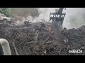 cleaning up a burn pile with the takeuchi tb260 mini excavator.