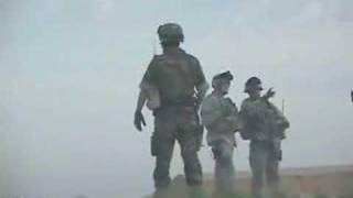 U.S. and Iraqi army soldiers conduct a cordon and search