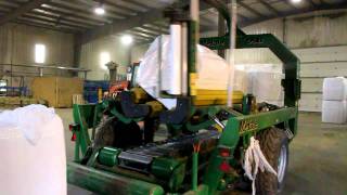 Wrapping Compressed Canadian Hay for International Export Shipping