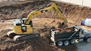 Cat 335F Loading out trucks