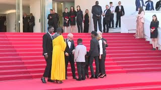 Cannes: "Mother and Son" crew hit the red carpet | AFP