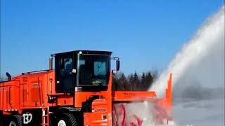 Larue T85 self-propelled dual-engine snow blower operating in Deer Lake