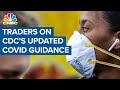 Traders discuss CDC's updated guidance on isolation and quarantine times for all