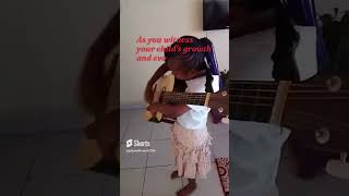 kid plays guitar for fun, fun for kids
