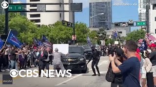 Protester detained after rushing Trump's motorcade outside Miami courthouse
